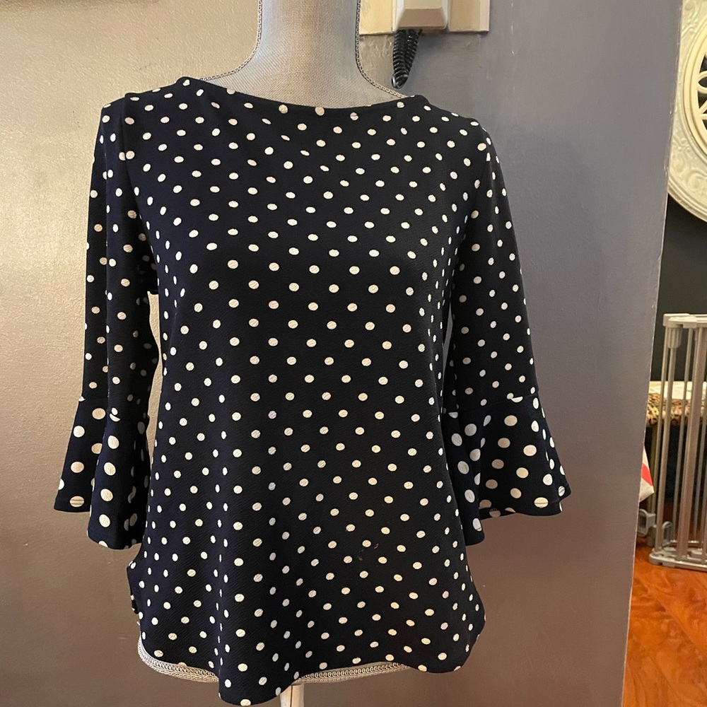 Navy and white polka dot , flared sleeves top in size medium.